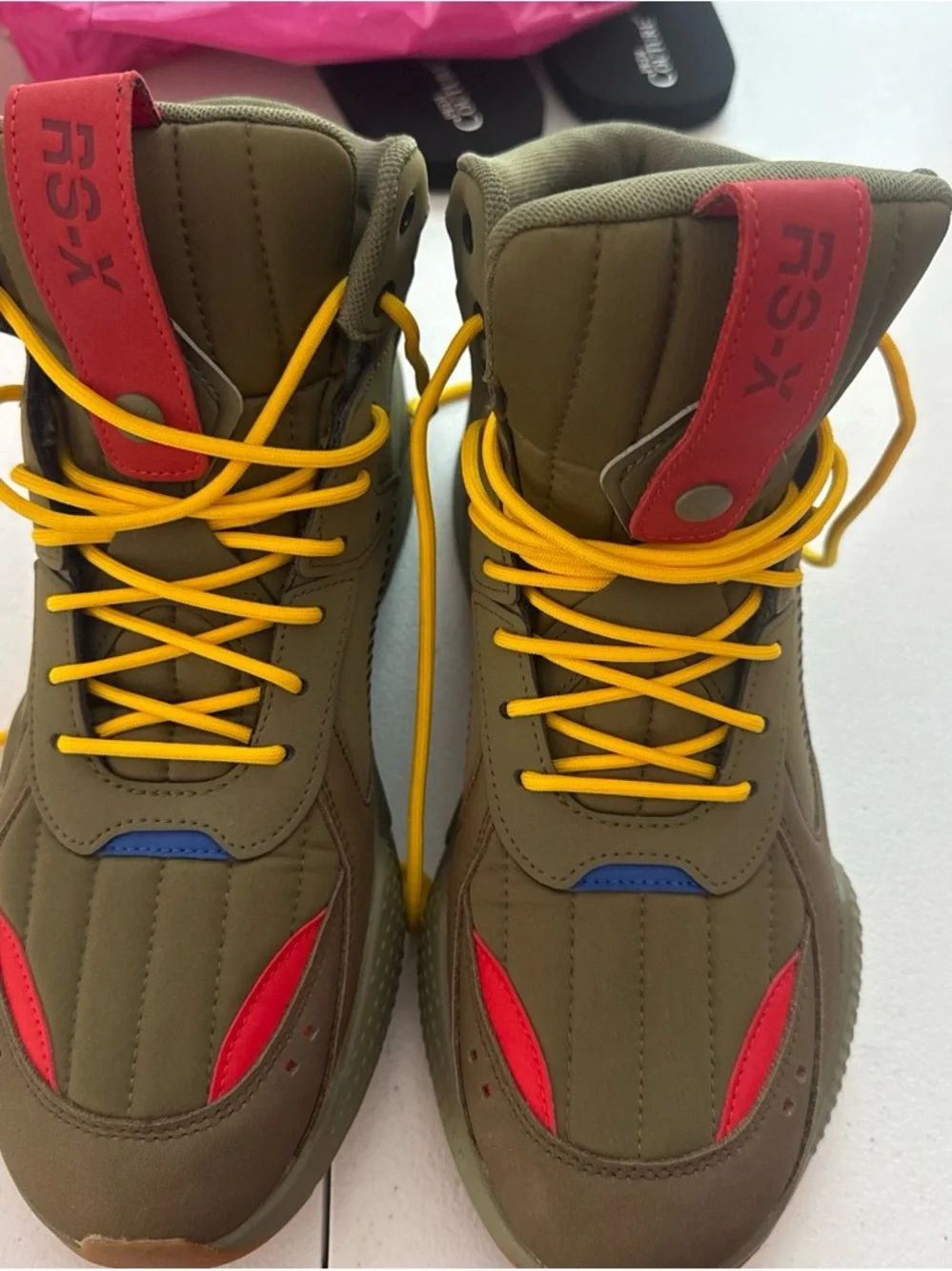 Puma Olive High-Top Boots with Yellow Laces and Red Accents